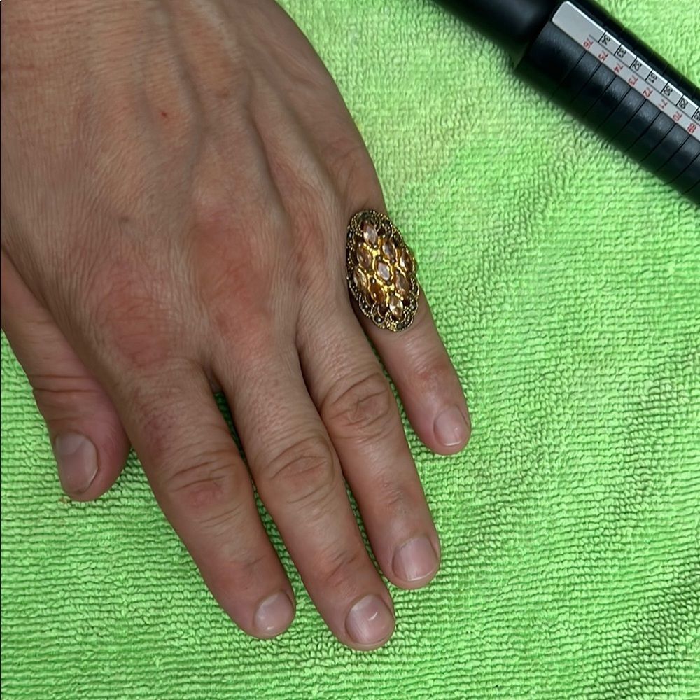Elegant Gold Ring with Yellow Gemstones